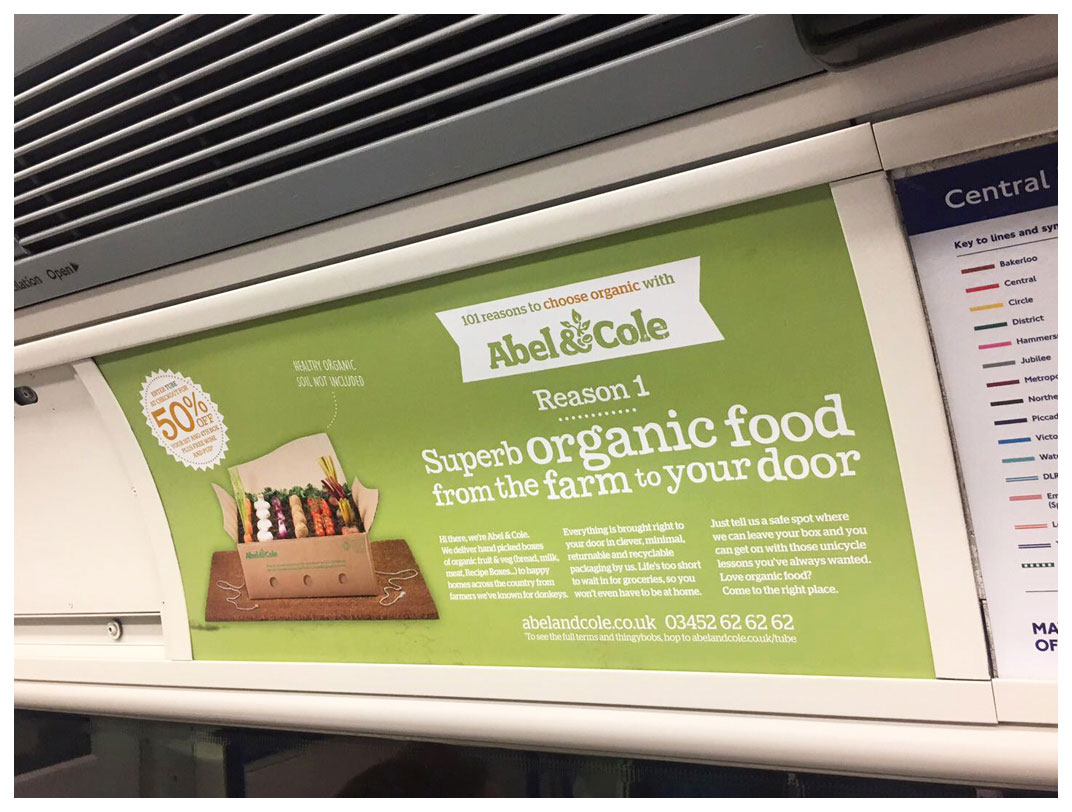 A photograph of a tube advert with the campaign's primary message